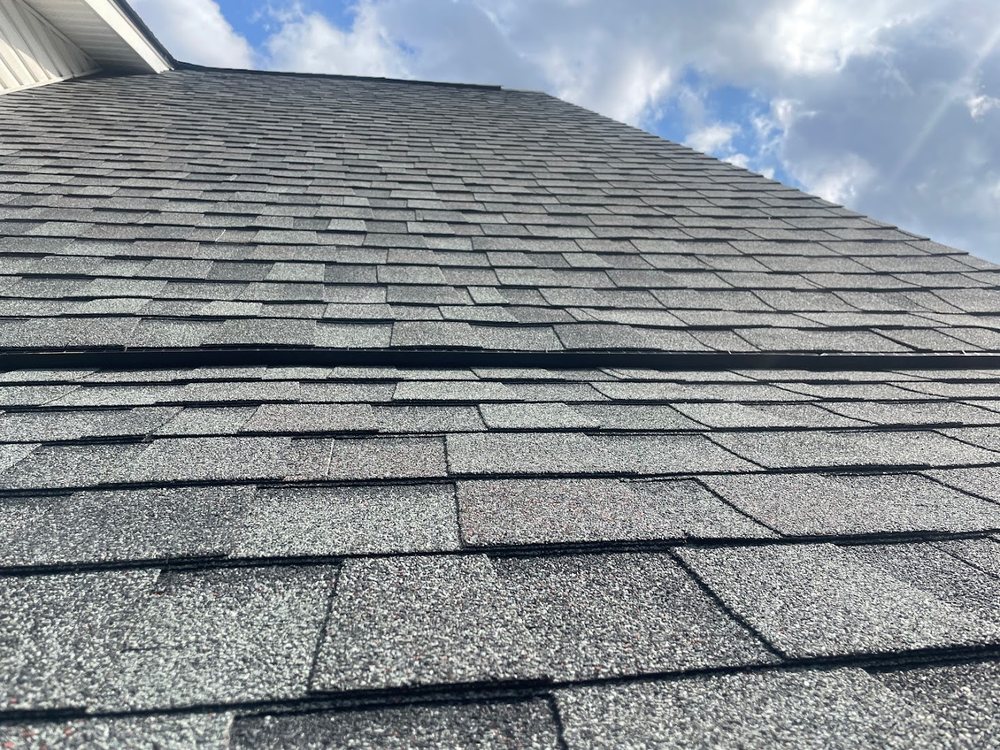 Roof Replacement by Emerald Roofing using New architectural shingle field