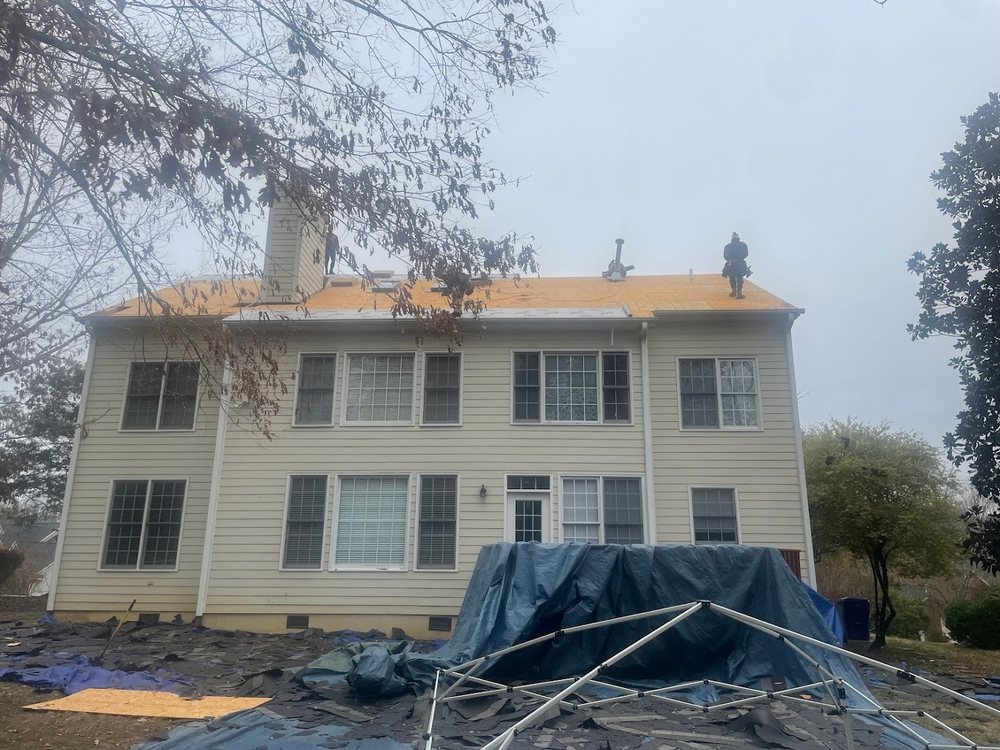 Roof Replacement by Emerald Roofing using Tear off complete, decking exposed
