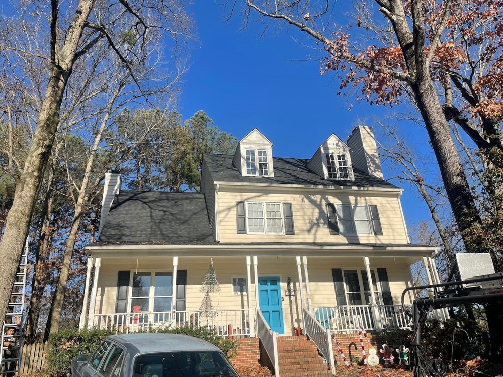 Roof Replacement by Emerald Roofing using Completed roof on a colonial with dormers