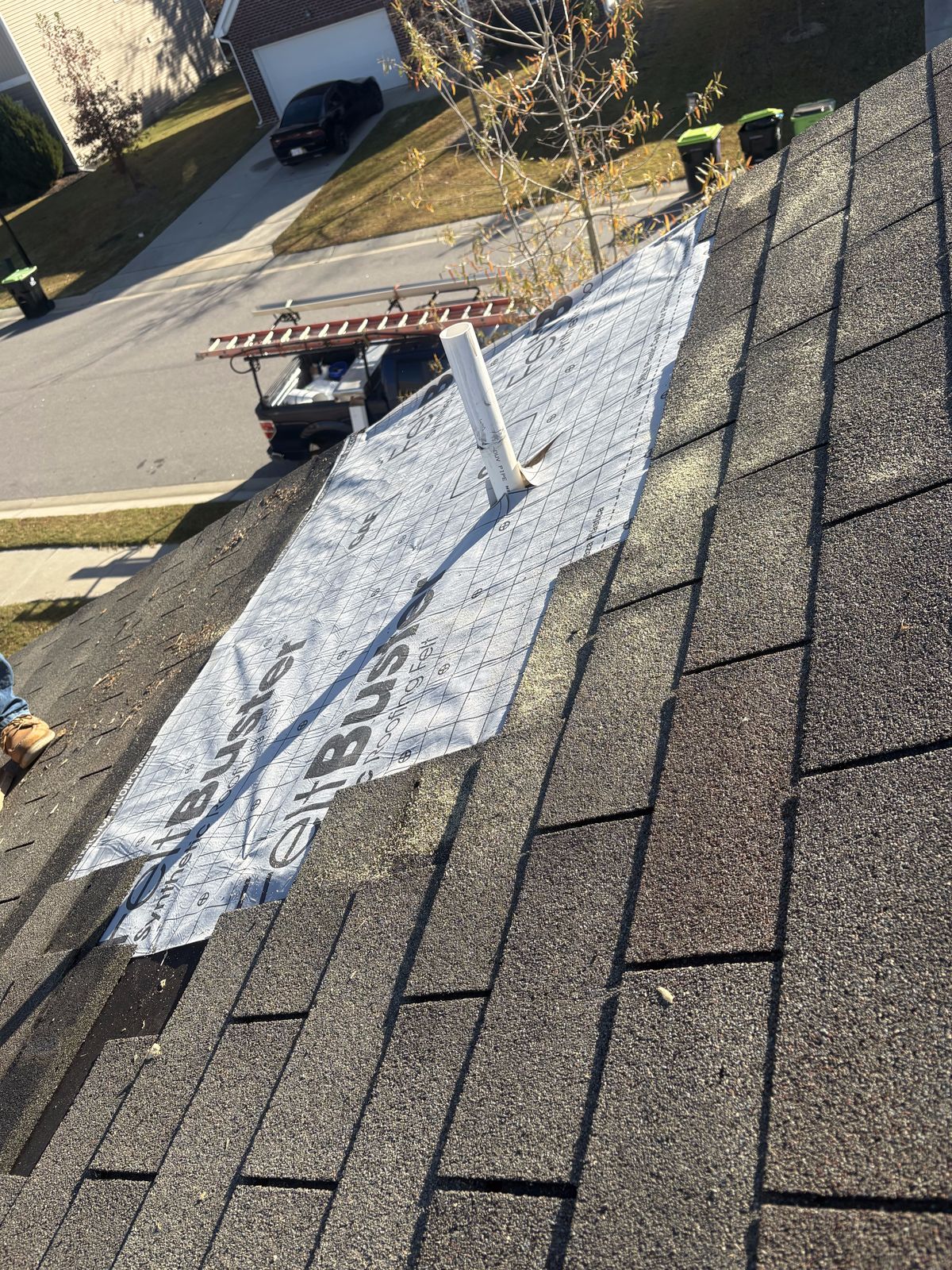 Roof Repair by Emerald Roofing using New decking in and synthetic underlayment laid over the repair